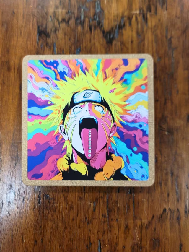 A square cork coaster featuring a colorful, psychedelic pop-art illustration of Naruto from Naruto, displayed on a dark wood tabletop.