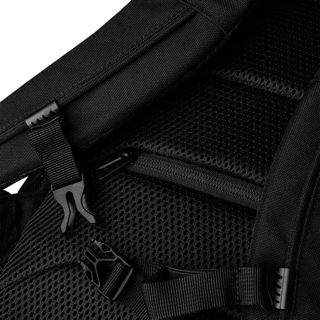 Yuh and MI Utility Backpack - side view showing straps and construction
