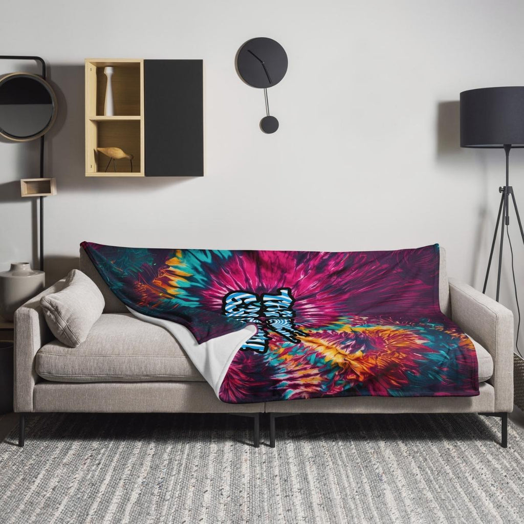 gallery throw blanket draped over sofa, adding cozy style and vibrant decor accent to living room