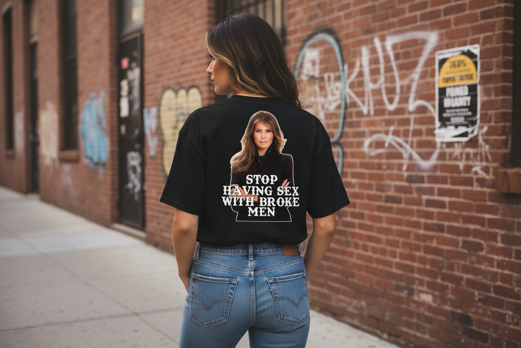 Rear view of model wearing black ‘Know Your Worth’ graphic tee showcasing the statement back artwork