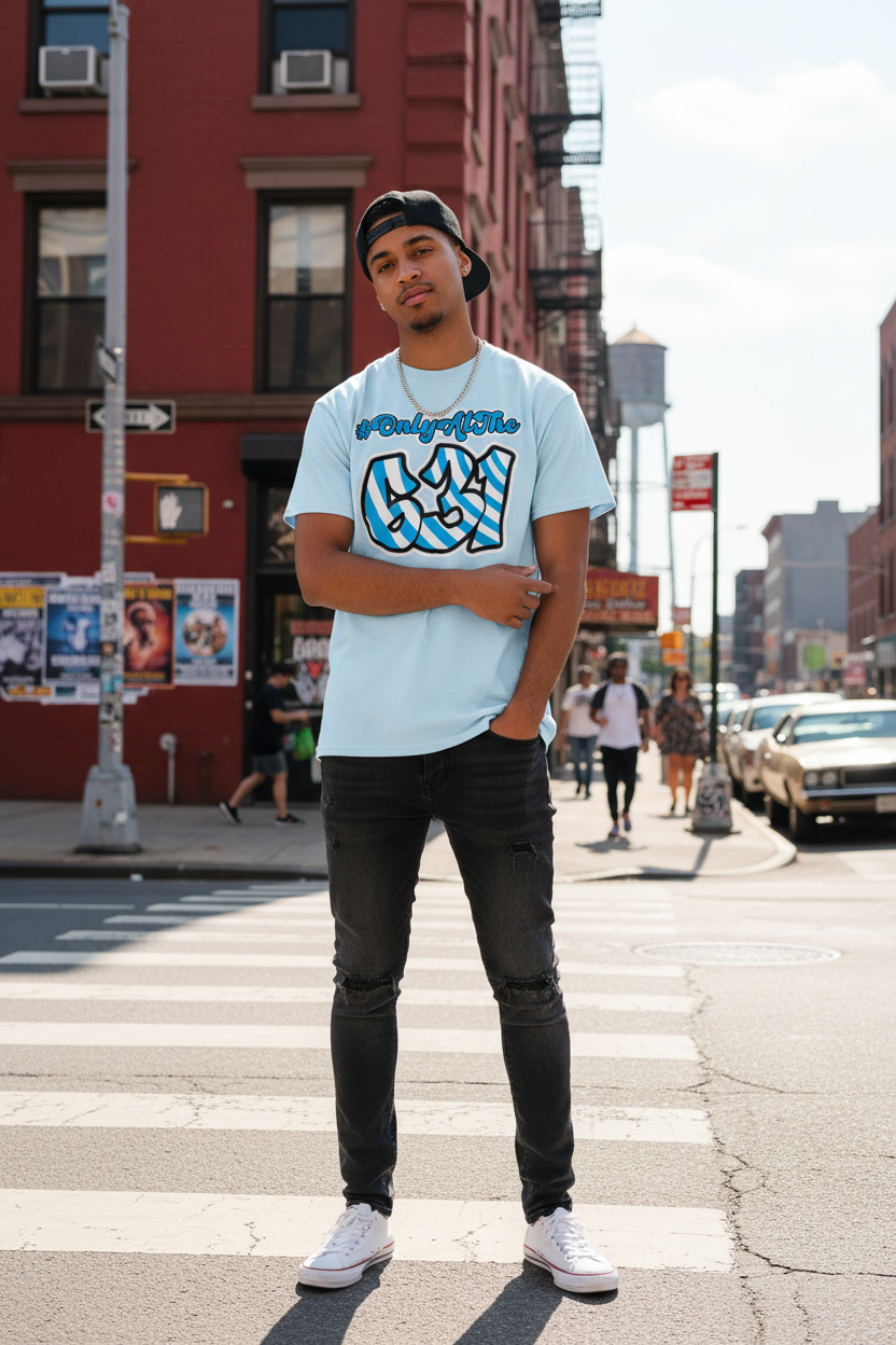 Person wearing Only at the 631 graphic tee with bold typography in Long Island urban street setting, local pride streetwear lifestyle photograph