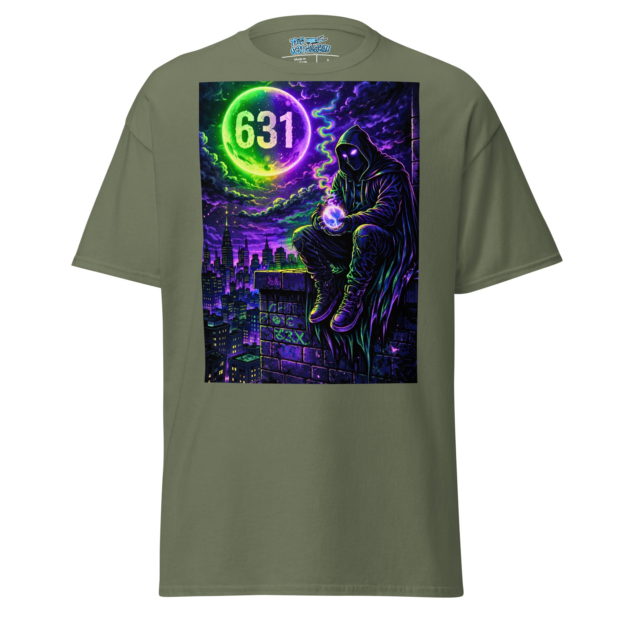 An olive green short-sleeve t-shirt with a large, vibrant graphic print on the front. The graphic depicts a hooded figure sitting on a rooftop at night under a purple and black stormy sky, with a glowing green neon moon displaying the number '631'.