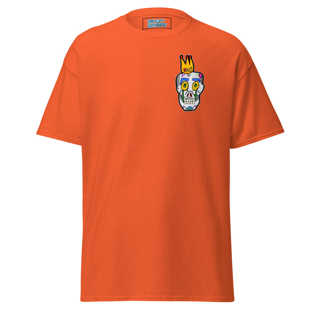 Orange t-shirt with a colorful skull design on the chest against a white background